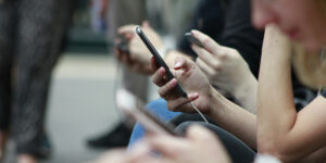 hands holding cellphones