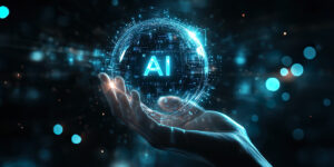A close-up of a hand gently holding a glowing sphere with the letters AI prominently displayed in the center. The sphere emits a bright blue light, symbolizing the power and potential of artificial intelligence. This image conveys a futuristic vision of AI technology being carefully controlled and harnessed by human innovation.
