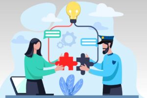 Law Enforcement Collaboration Within Multidisciplinary Teams Illustration of woman and police officer sharing puzzle pieces and coming to a single idea