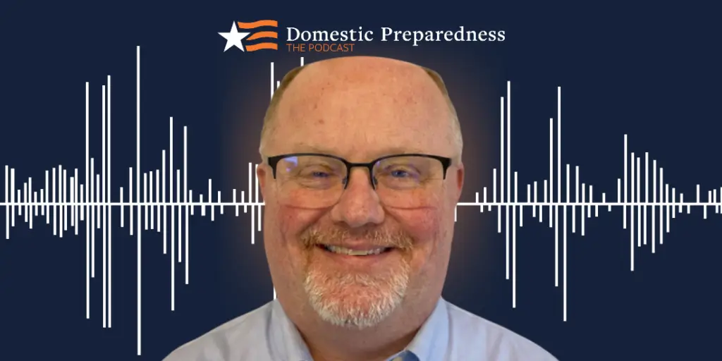 Domestic Preparedness: The Podcast logo above a headshot of Kevin Crouse with a sound bar image in the background.