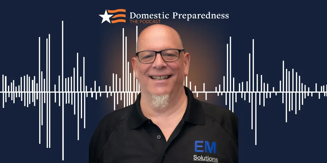 Domestic Preparedness: The Podcast logo above a headshot of Chris Hawley with a sound bar image in the background.